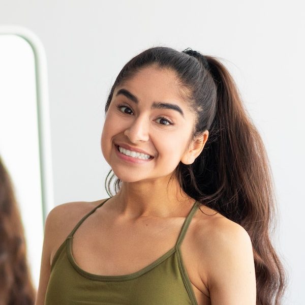 smiling-young-indian-woman-e1678896915304